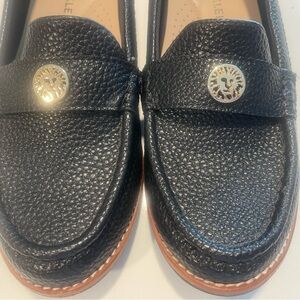 Anne Klein Textured Black Loafers with Signature Gold Emblem